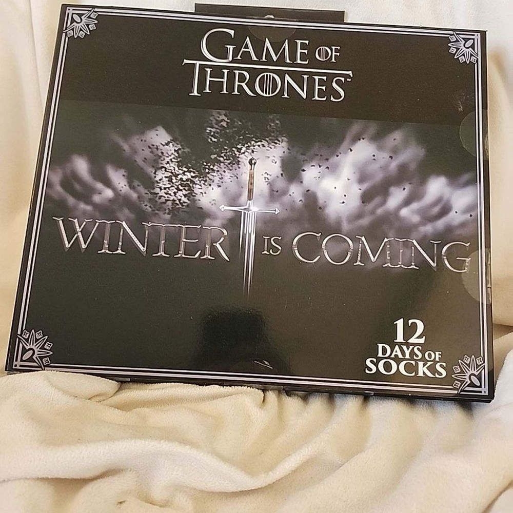 Game of Thrones. 12 pairs of socks. New in box.  Great gift.  Fast shipping
